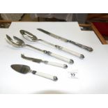 A superb quality salad and cheese server set and a silver handled bread knife