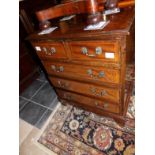 A small mahogany 2 over 3 chest of drawers