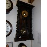 A Victorian 'figure of eight' wall clock