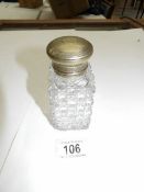A hobnail glass scent bottle with plated top