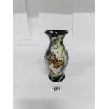 An unusual Moorcroft vase decorated with butterflies