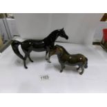 A Beswick Shetland pony and a Beswick black horse