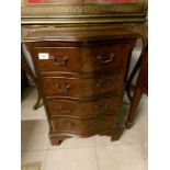 A small walnut 4 drawer chest