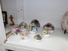 A quantity of porcelain posies including Aynsley