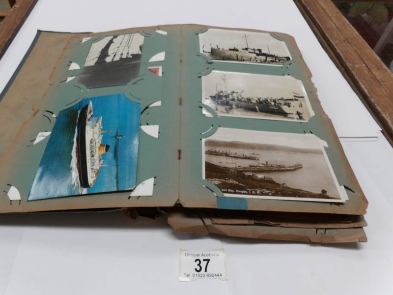 An album of Edwardian postcards including ships