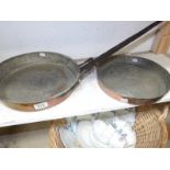 2 copper pans