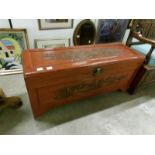 A Chinese carved camphor wood chest