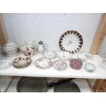 A mixed lot of plates and dishes