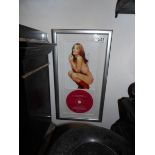 A framed and glazed Kylie Minogue promotional photo and CD