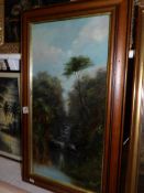 A framed 19th century oil on canvas of a waterfall, image 60 x 29cm,