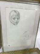 An original pencil drawing of a young  boy by Dorothy Lee Roberts (believed to be her son)