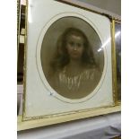 An oval pastel portrait of a young girl, frame a/f, image 54 x 46cm,