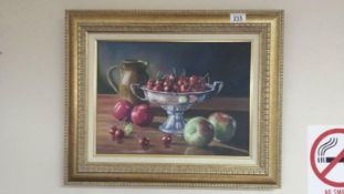 A framed oil on canvas, still life with cherries. Signed John Clark image 39.5cm x 29cm