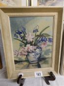 An oil on board flowers in vase by Peter White, image 35 x 18cm,