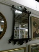 A 19th century mahogany framed bevel edged mirror,
