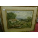 A framed and glazed thatched cottage in watercolour signed I W Hepple, image 52 x 38cm,