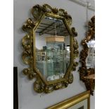 A gilt framed Victorian mirror,
