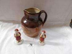 A large Doulton stoneware hunting jug and 2 Royal Doulton snowmen figures