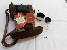 A Zeiss Ikon cameral in leather case,