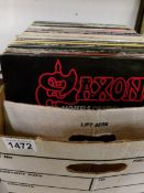 A box of LP records including rock