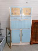 A 1960's kitchen cabinet