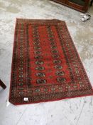 A good quality red patterned rug