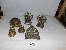A small collection of Asian brass items including Indian Dieties