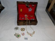 A jewellery casket and mixed lot of costume jewellery