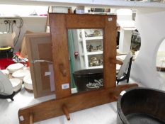 An oak 'Arts & Crafts' hall mirror