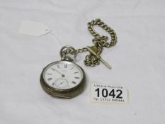 A silver pocket watch (Mansell,
