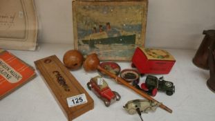 A mixed lot of vintage toys including picture blocks,