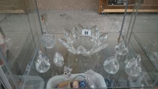 A quantity of glass swans,