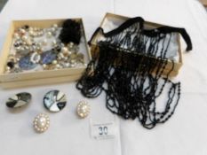 A mixed lot of jewellery including black bead deco style collar