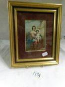 A framed and glazed depiction of the Madonna and Child