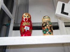 2 sets of Russian nesting dolls