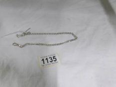 A silver pocket watch chain with crab claw clasp and T bar, HM Birmingham 1902/03, 17.