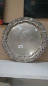 An ornate silver plated tray