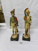 A pair of soldier figurines