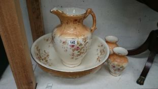 A Victorian jug and basin set