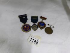3 1960's silver bowling medals and one other