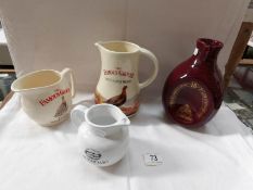 A Wade Famous Grouse and 3 other whisky advertising jugs