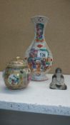 An early (possibly 18th century) Chinese vase, a Chinese lidded pot and a Chinese figure
