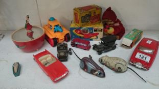 A collection of vintage toys including tin plate