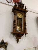 A mahogany wall clock