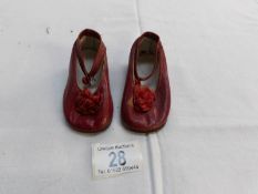 A pair of vintage red leather shoes marked Fuerto