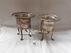 A pair of Regency style silver plated bottle coasters