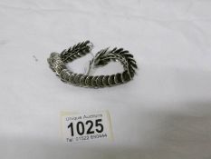 A Tibetan silver? drain bracelet,