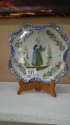 A Quimper hand decorated plate