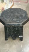 A 19th century carved wood stool