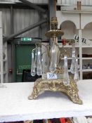 An ornate gilt and marble table lamp base